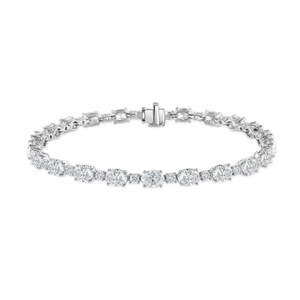18ct White Gold Oval & Round Brilliant Cut Diamond Bracelet at David M Robinson