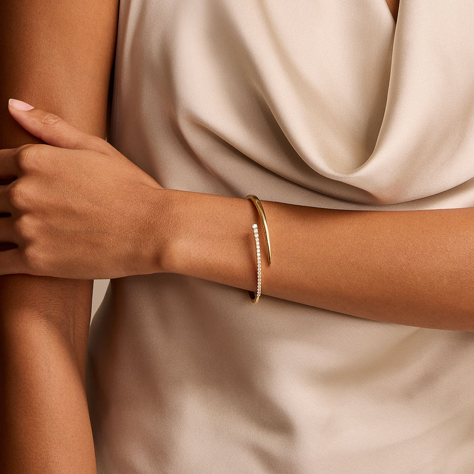 18ct Yellow Gold Crossover Diamond Bangle at David M Robinson
