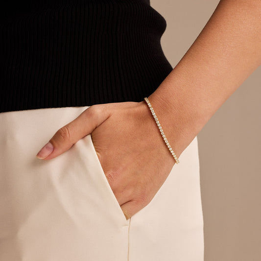 18ct Yellow Gold Round Brilliant Cut Diamond Tennis Bracelet at David M Robinson