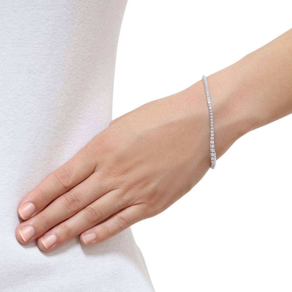 18ct White Gold Diamond Tapered Tennis Bracelet at David M Robinson