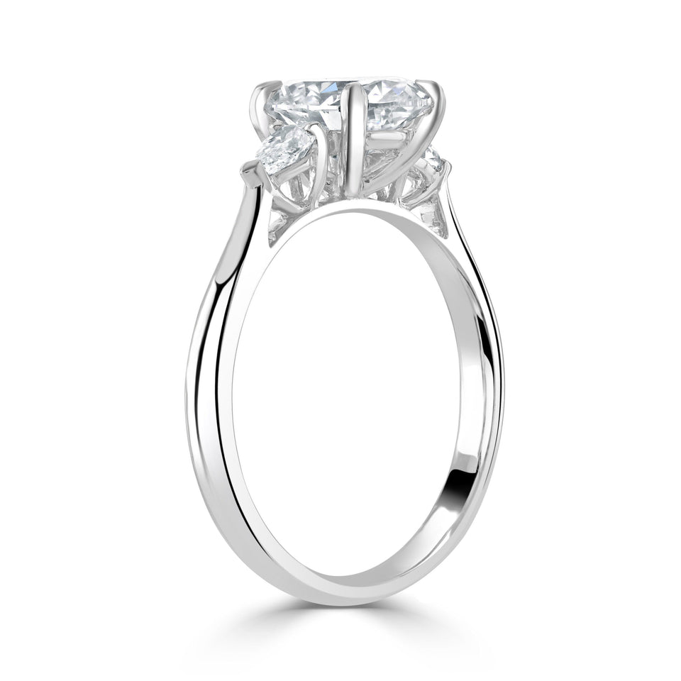 Oval Cut Platinum Trilogy Ring