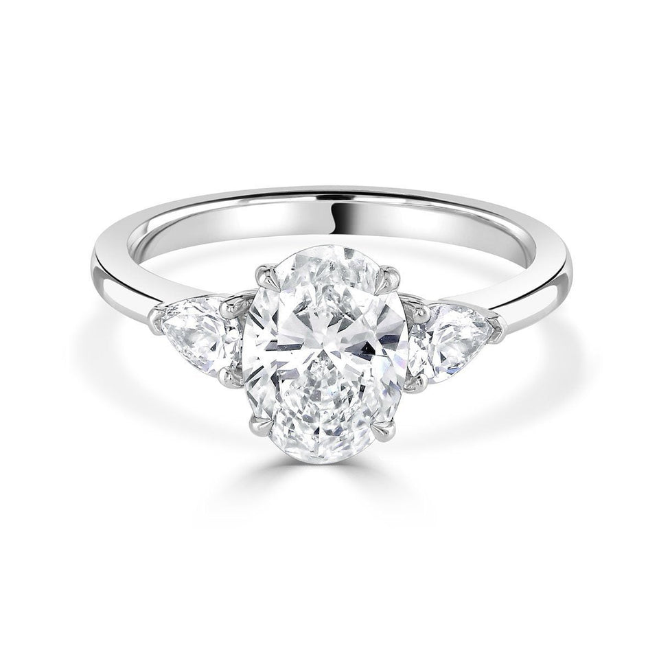 Oval Cut Platinum Trilogy Ring