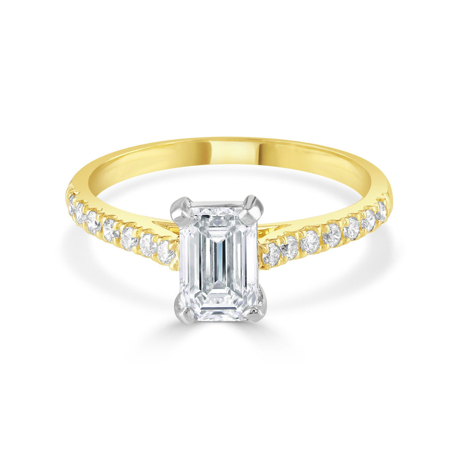 Emerald Cut 18ct Yellow Gold Diamond Ring with Diamond Set Shoulders at David M Robinson