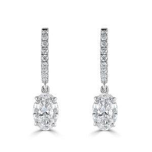 Platinum Oval Cut Diamond Huggie Earrings