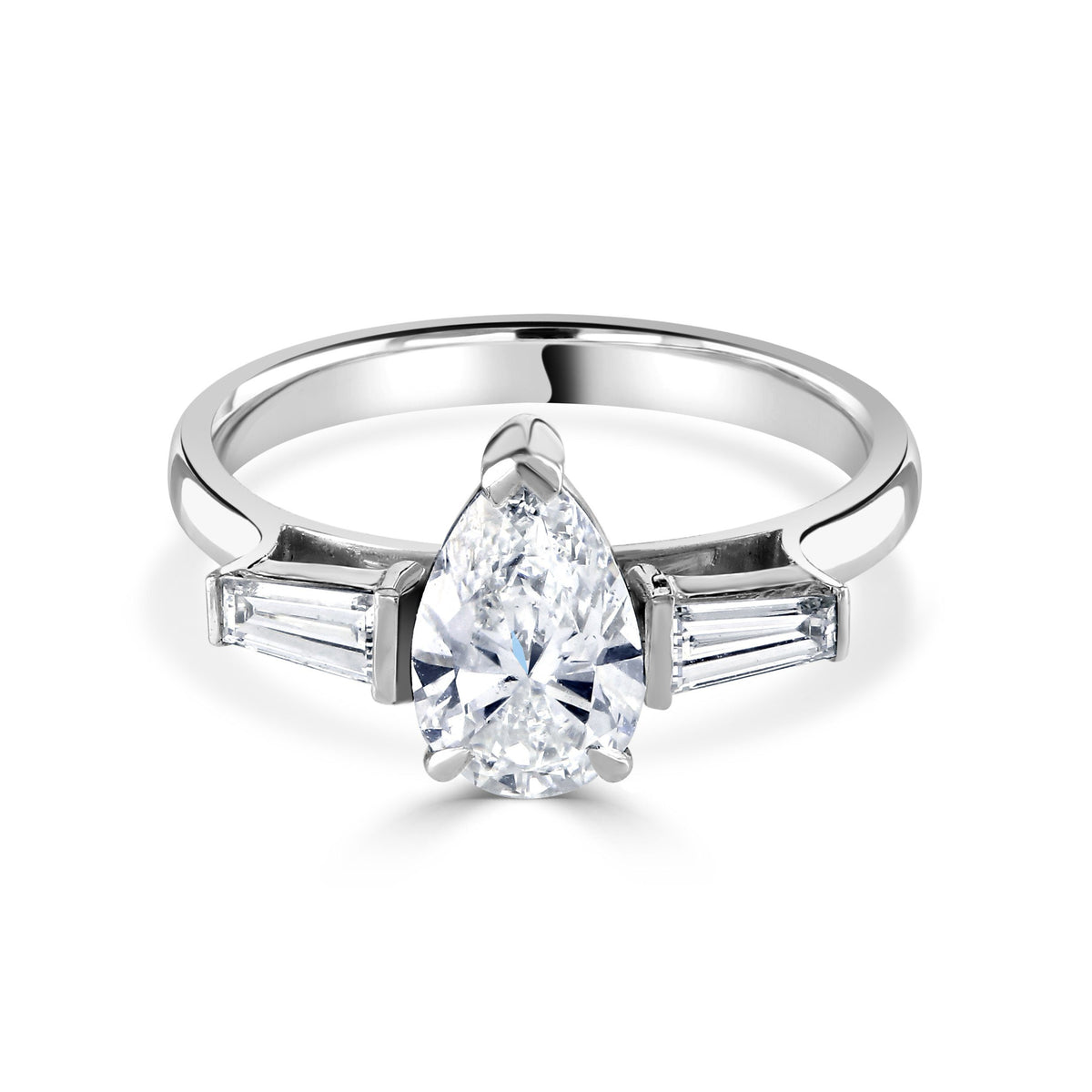 Pear Cut Three Stone Platinum Diamond Ring at David M Robinson
