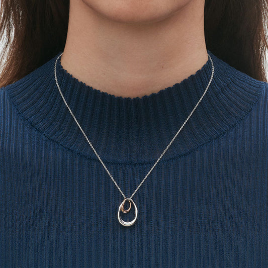 Georg Jensen Offspring Sterling Silver and 18ct Rose Gold Pendant at David M Robinson