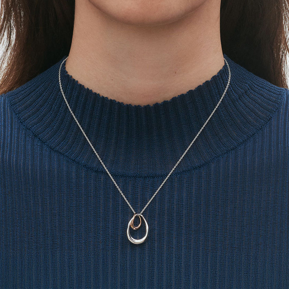 Georg Jensen Offspring Sterling Silver and 18ct Rose Gold Pendant at David M Robinson