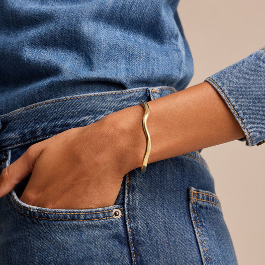 Making Waves 18ct Yellow Gold Bangle at David M Robinson