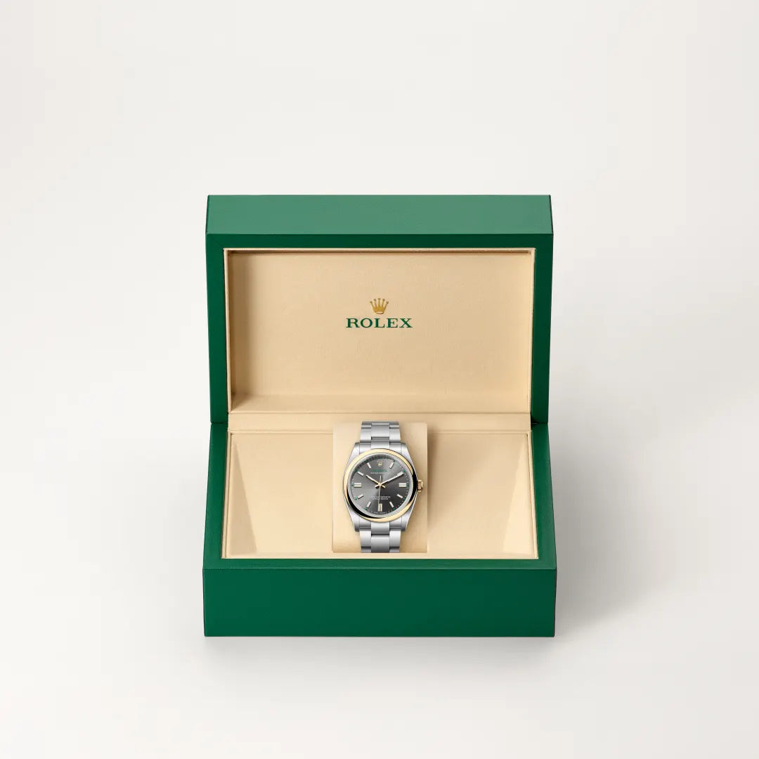 Rolex Oyster Perpetual 36 in Yellow Rolesor - combination of Oystersteel and yellow gold with a Slate dial, Domed bezel, Oyster, three-piece solid links bracelet