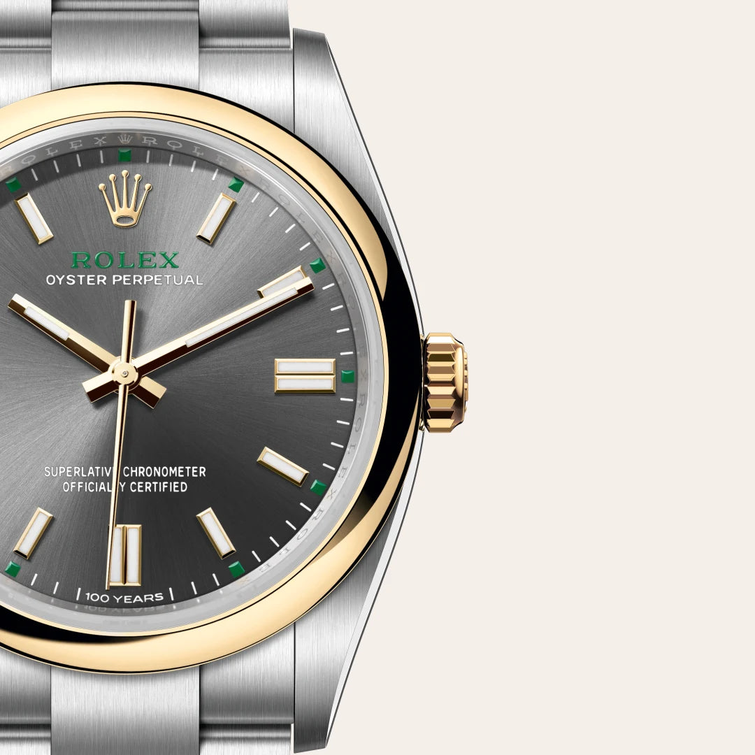 Rolex Oyster Perpetual 36 in Yellow Rolesor - combination of Oystersteel and yellow gold with a Slate dial, Domed bezel, Oyster, three-piece solid links bracelet