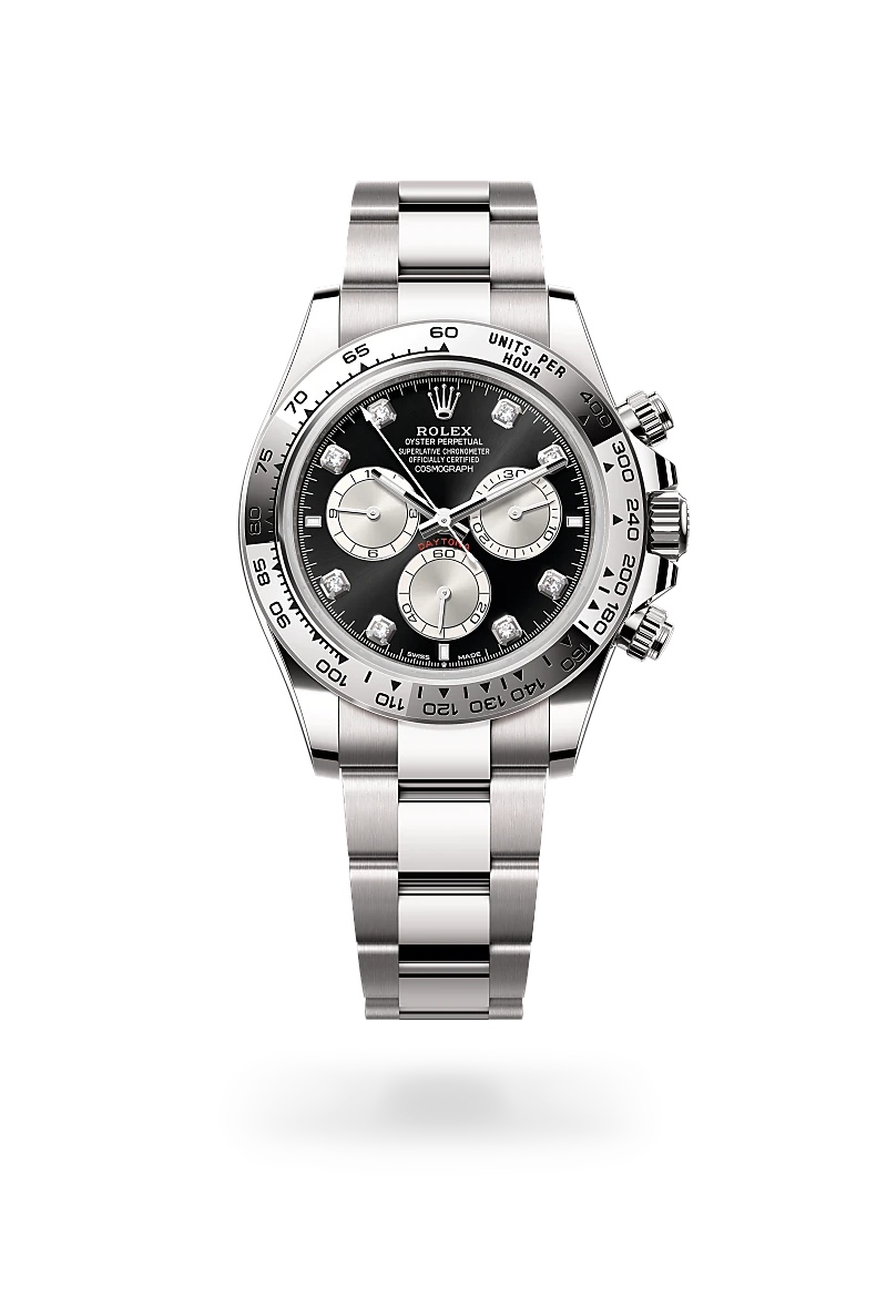 Rolex Cosmograph Daytona in 18 ct white gold with a Bright black and steel set with diamonds dial, Fixed, with engraved tachymetric scale, in 18 ct white gold bezel, Oyster, three-piece solid links bracelet