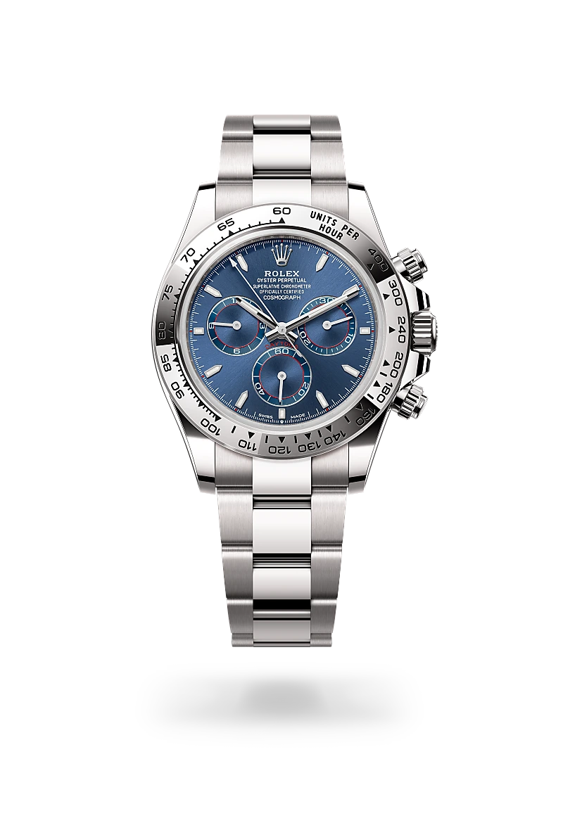 Rolex Cosmograph Daytona in 18 ct white gold with a Bright blue dial, Fixed, with engraved tachymetric scale, in 18 ct white gold bezel, Oyster, three-piece solid links bracelet