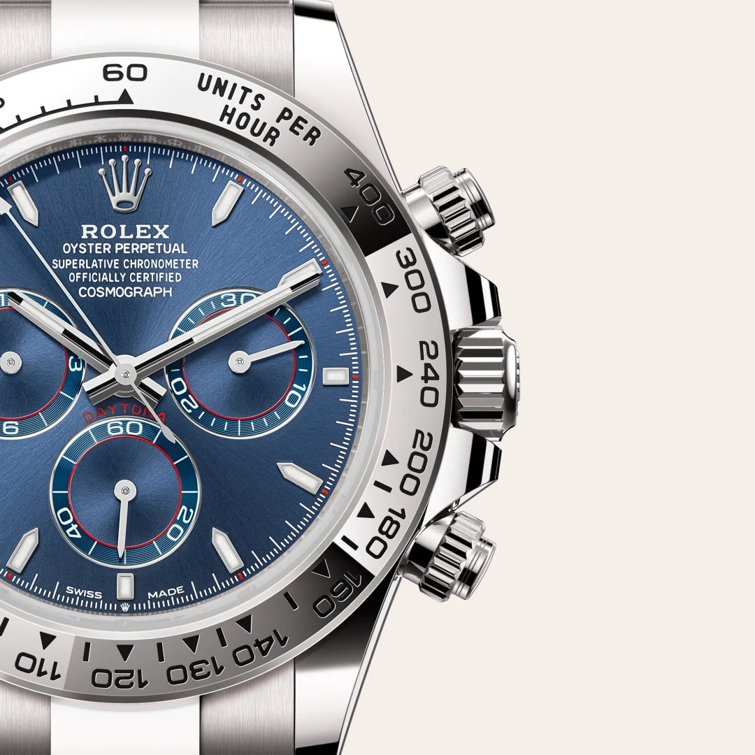 Rolex Cosmograph Daytona in 18 ct white gold with a Bright blue dial, Fixed, with engraved tachymetric scale, in 18 ct white gold bezel, Oyster, three-piece solid links bracelet
