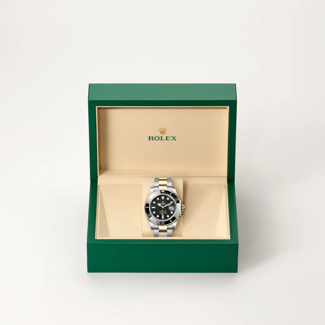 Rolex Submariner Date in Yellow Rolesor - combination of Oystersteel and yellow gold with a Black dial, Unidirectional rotatable 60-minute graduated, scratch-resistant Cerachrom insert in black ceramic, numerals and graduations coated in gold bezel, Oyster, three-piece solid links bracelet