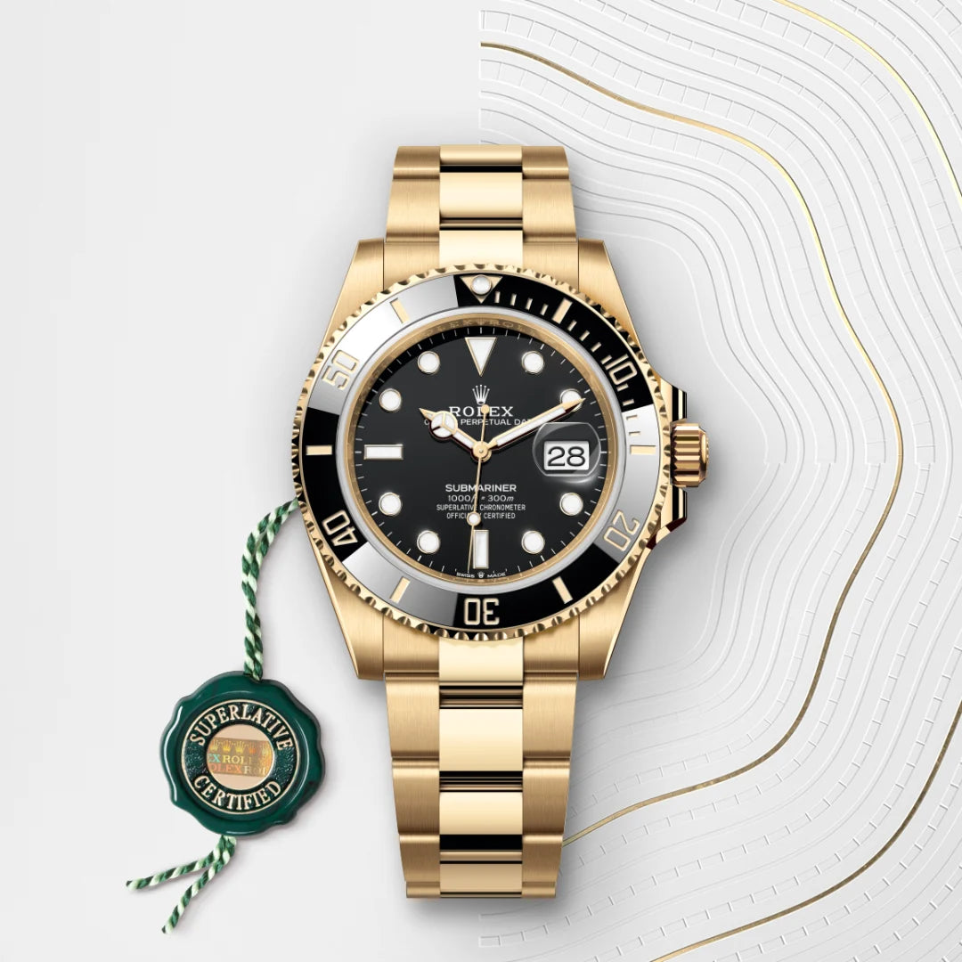 Rolex Submariner Date in 18 ct yellow gold with a Black dial, Unidirectional rotatable 60-minute graduated, scratch-resistant Cerachrom insert in black ceramic, numerals and graduations coated in gold bezel, Oyster, three-piece solid links bracelet