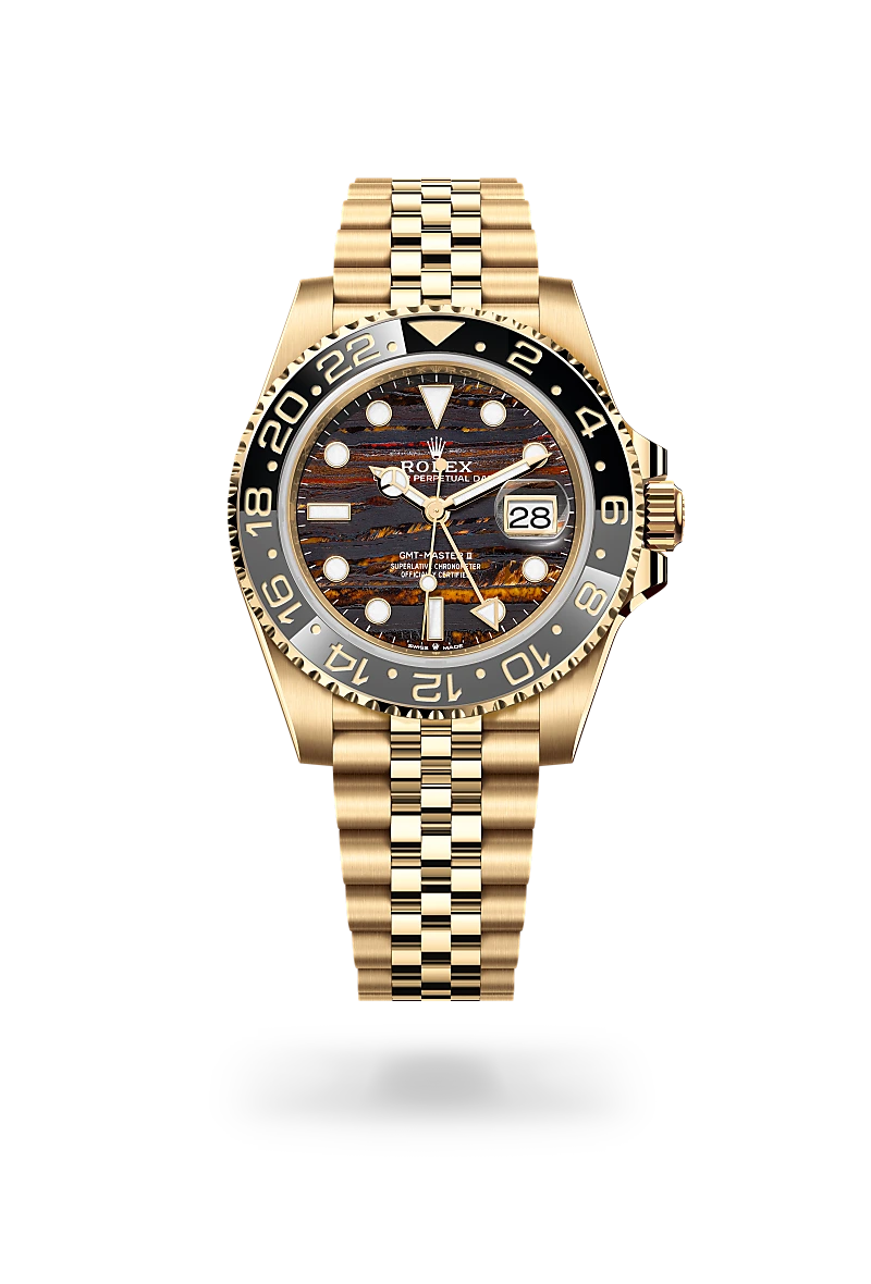 Rolex GMT-Master II in 18 ct yellow gold with a Tiger iron dial, Bidirectional rotatable 24-hour graduated bezel. Two-colour grey and black Cerachrom insert in ceramic, moulded numerals and graduations bezel, Jubilee, five-piece links bracelet
