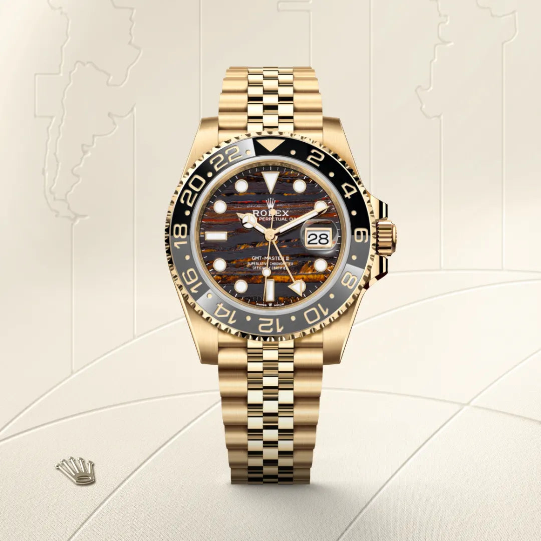 Rolex GMT-Master II in 18 ct yellow gold with a Tiger iron dial, Bidirectional rotatable 24-hour graduated bezel. Two-colour grey and black Cerachrom insert in ceramic, moulded numerals and graduations bezel, Jubilee, five-piece links bracelet