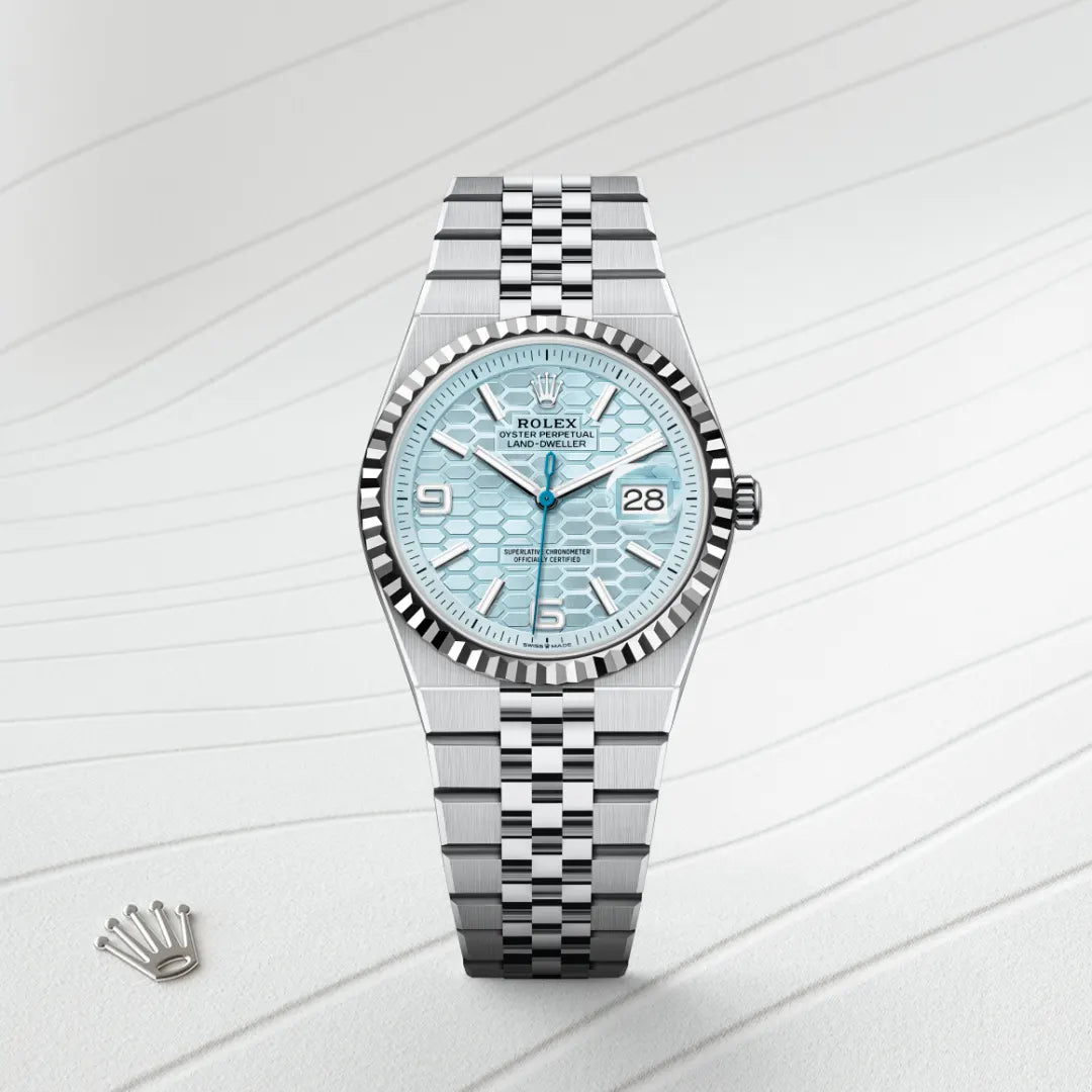 Rolex Land-Dweller 36 in Platinum with a Ice blue, honeycomb motif dial, Fluted bezel, Flat Jubilee, five-piece solid links bracelet