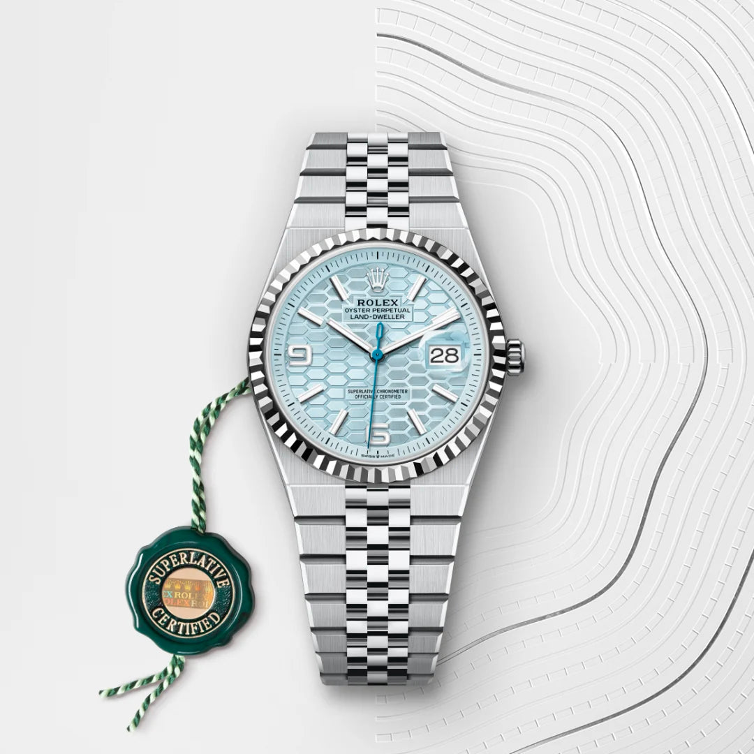 Rolex Land-Dweller 36 in Platinum with a Ice blue, honeycomb motif dial, Fluted bezel, Flat Jubilee, five-piece solid links bracelet