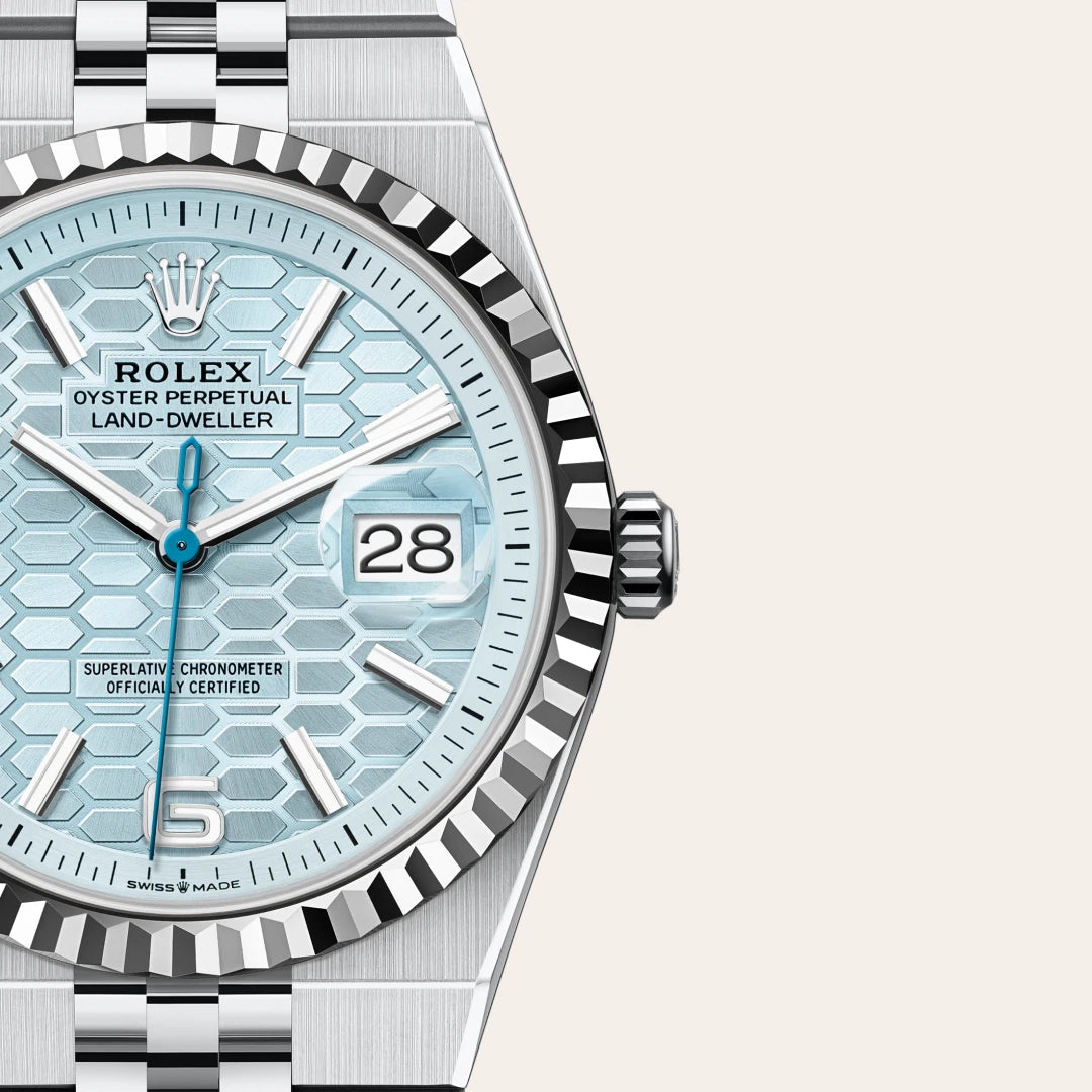 Rolex Land-Dweller 36 in Platinum with a Ice blue, honeycomb motif dial, Fluted bezel, Flat Jubilee, five-piece solid links bracelet