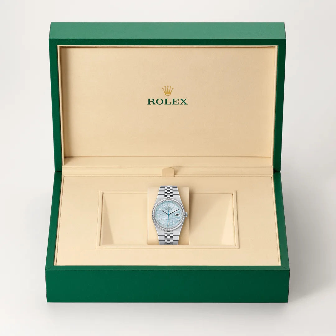 Rolex Land-Dweller 36 in Platinum with a Ice blue, honeycomb motif set with diamonds dial, Set with diamonds bezel, Flat Jubilee, five-piece solid links bracelet