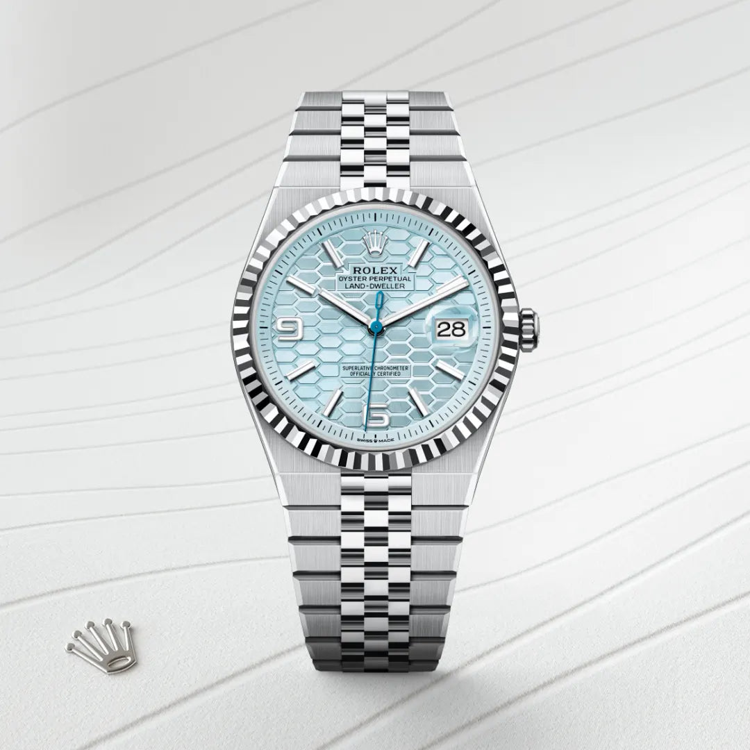 Rolex Land-Dweller 40 in Platinum with a Ice blue, honeycomb motif dial, Fluted bezel, Flat Jubilee, five-piece solid links bracelet