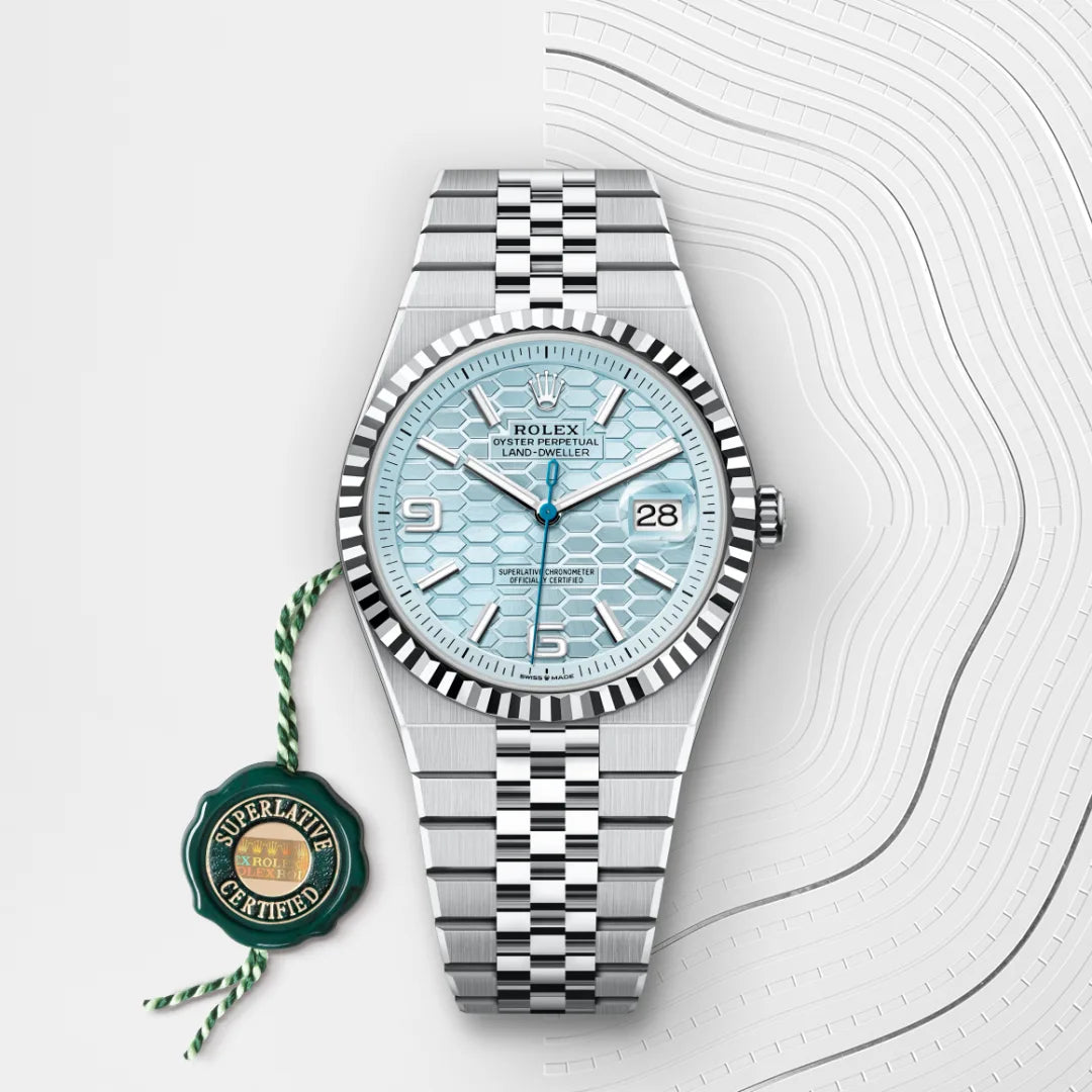 Rolex Land-Dweller 40 in Platinum with a Ice blue, honeycomb motif dial, Fluted bezel, Flat Jubilee, five-piece solid links bracelet