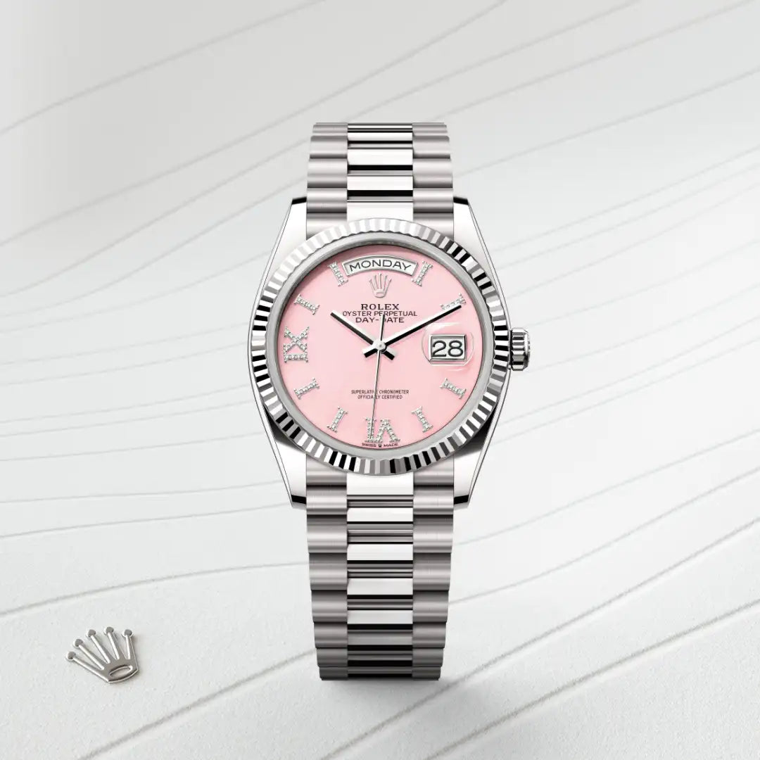 Rolex Day-Date 36 in 18 ct white gold with a Pink opal set with diamonds dial, Fluted bezel, President, semi-circular three-piece links bracelet