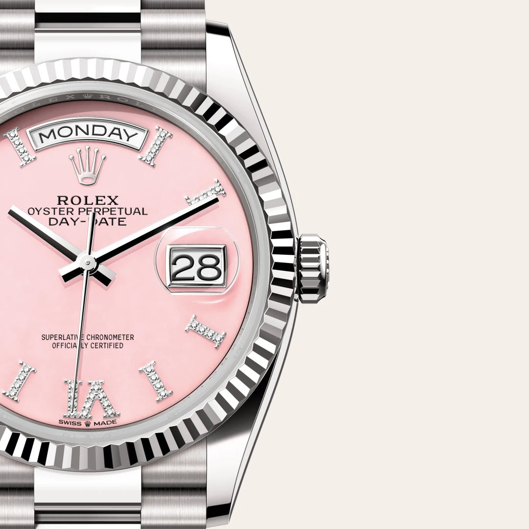 Rolex Day-Date 36 in 18 ct white gold with a Pink opal set with diamonds dial, Fluted bezel, President, semi-circular three-piece links bracelet