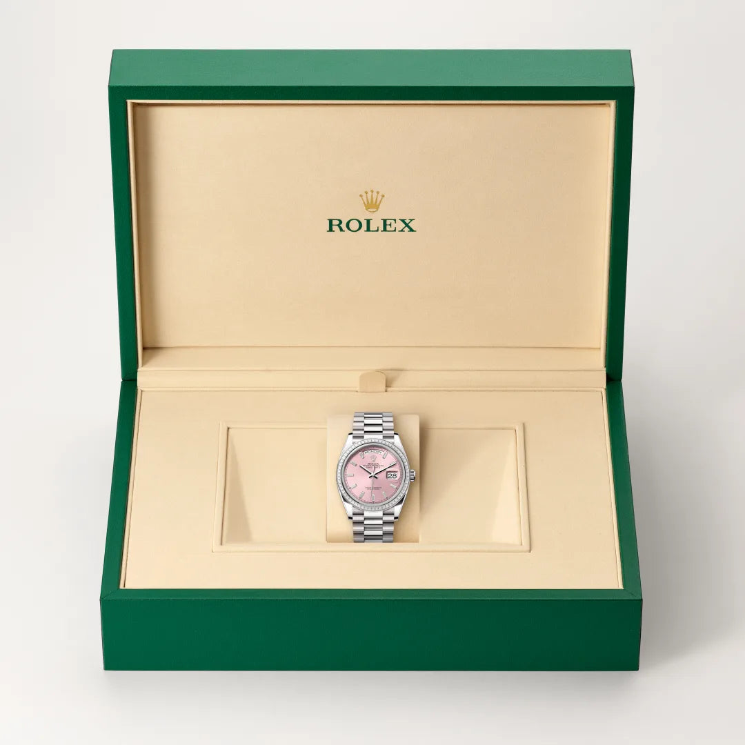 Rolex Day-Date 36 in 18 ct white gold with a Pink set with diamonds dial, Set with diamonds bezel, President, semi-circular three-piece links bracelet