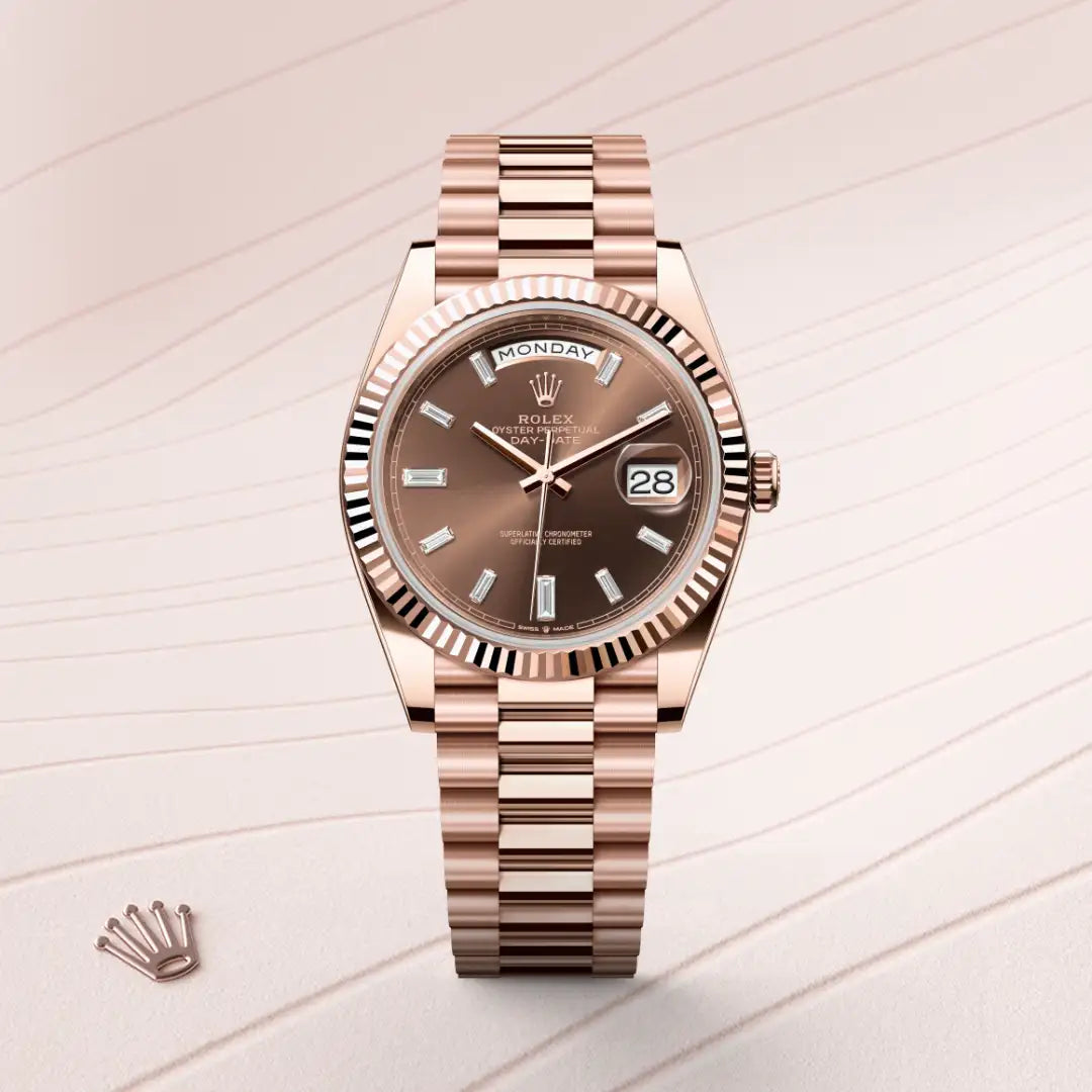 Rolex Day-Date 40 in 18 ct Everose gold with a Chocolate set with diamonds dial, Fluted bezel, President, semi-circular three-piece links bracelet