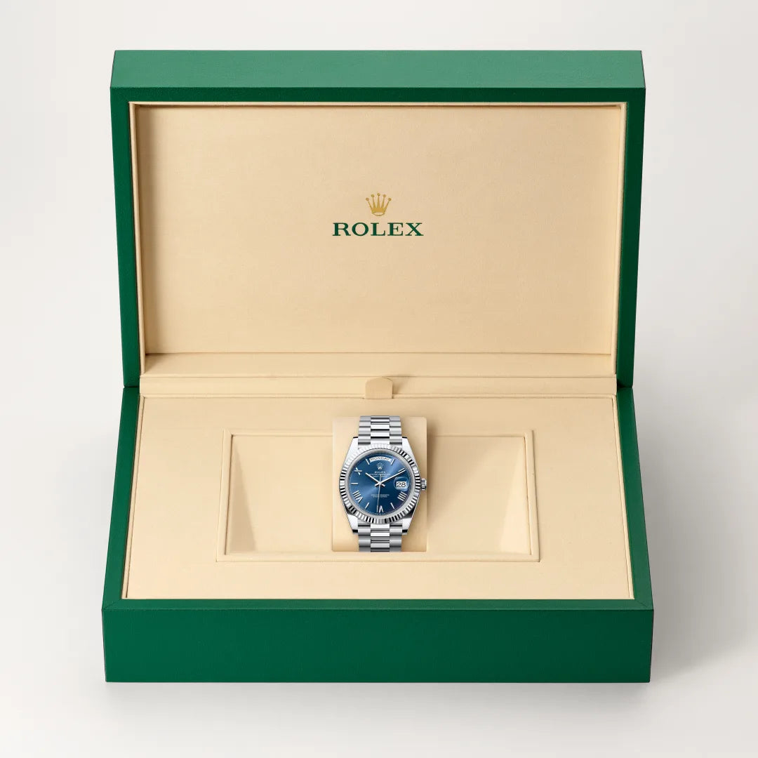 Rolex Day-Date 40 in Platinum with a Bright blue dial, Fluted bezel, President, semi-circular three-piece links bracelet