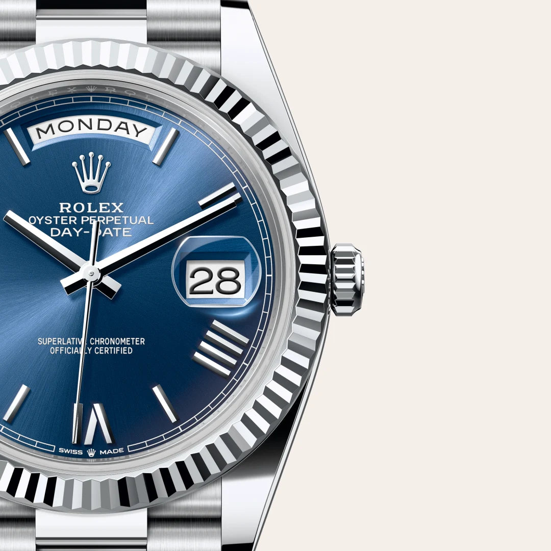 Rolex Day-Date 40 in Platinum with a Bright blue dial, Fluted bezel, President, semi-circular three-piece links bracelet