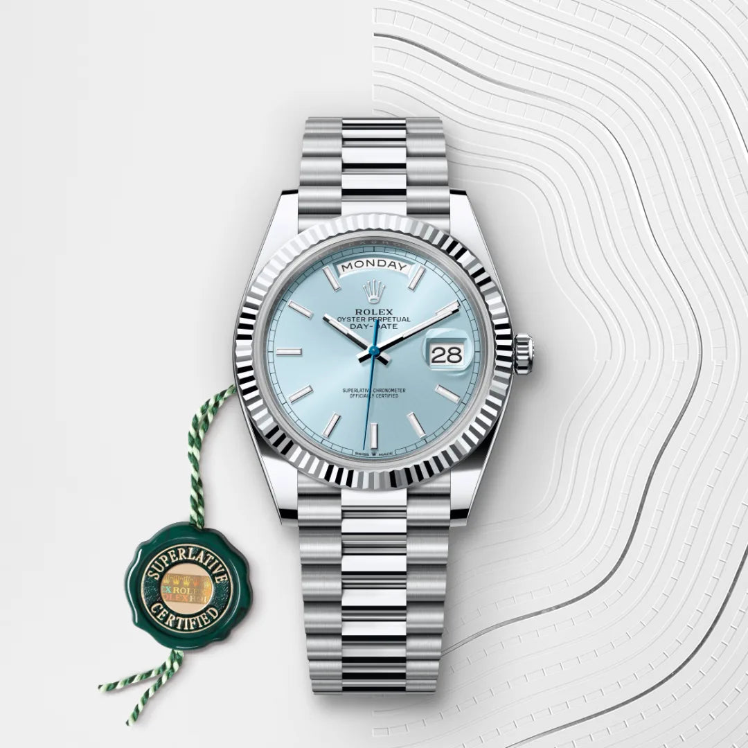 Rolex Day-Date 40 in Platinum with a Ice blue dial, Fluted bezel, President, semi-circular three-piece links bracelet