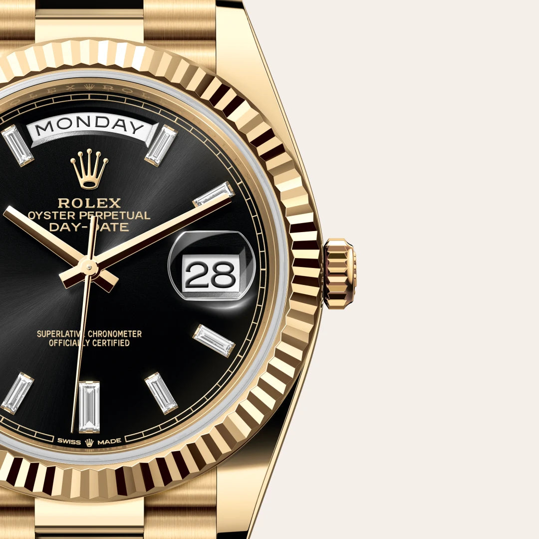Rolex Day-Date 40 in 18 ct yellow gold with a Bright black set with diamonds dial, Fluted bezel, President, semi-circular three-piece links bracelet