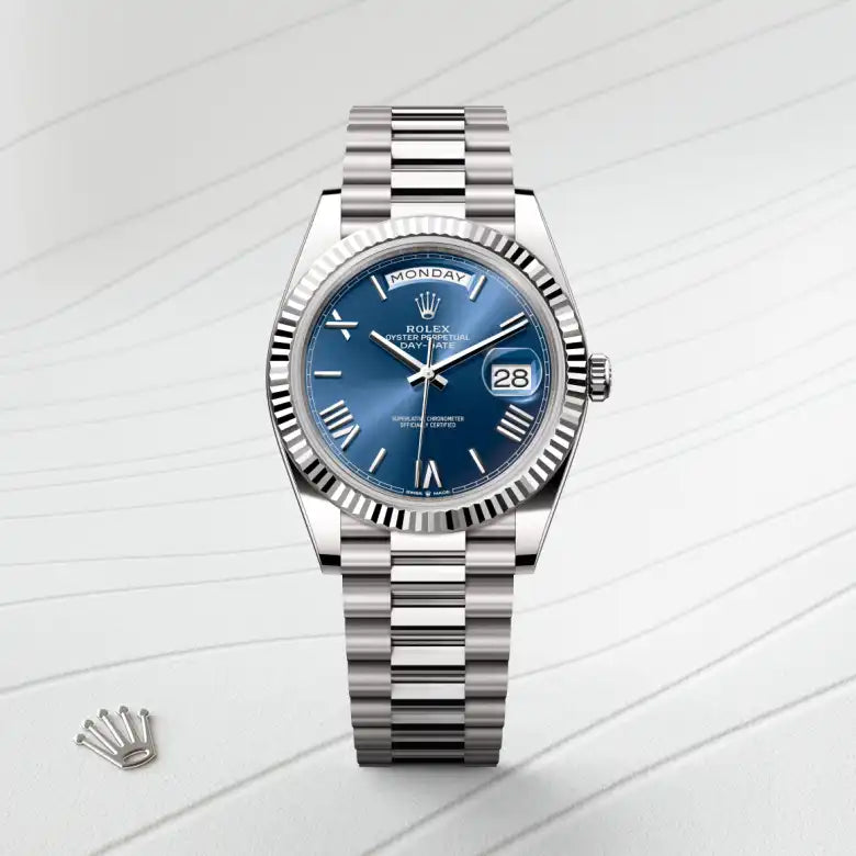 Rolex Day-Date 40 in 18 ct white gold with a Bright blue dial, Fluted bezel, President, semi-circular three-piece links bracelet