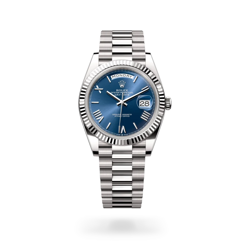 Rolex Day-Date 40 in 18 ct white gold with a Bright blue dial, Fluted bezel, President, semi-circular three-piece links bracelet