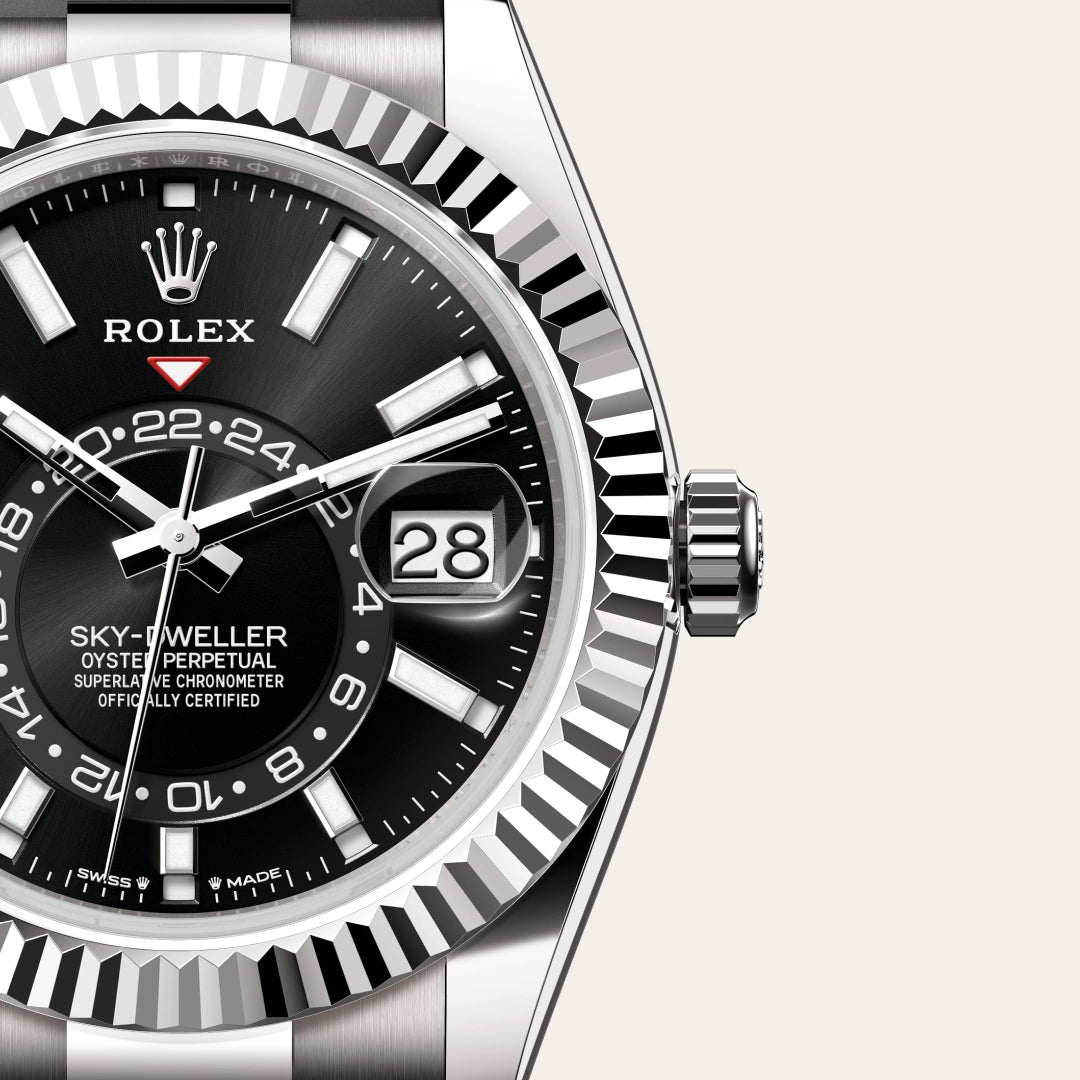 Rolex Sky-Dweller in 18 ct white gold with a Bright black dial, Fluted, bidirectional rotatable Rolex Ring Command bezel, Oysterflex bracelet