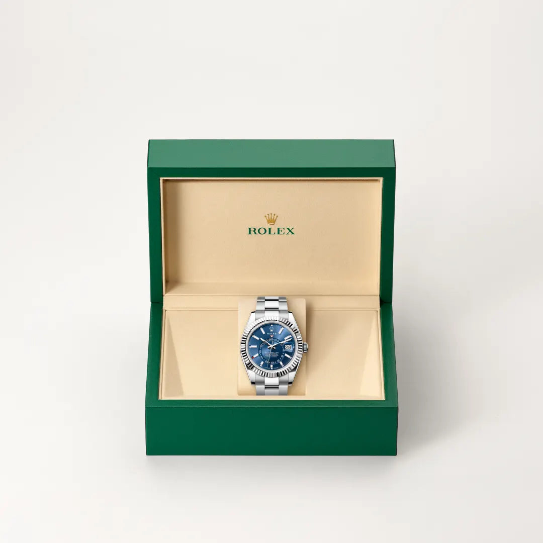 Rolex Sky-Dweller in White Rolesor - combination of Oystersteel and white gold with a Bright blue dial, Fluted, bidirectional rotatable Rolex Ring Command bezel, Oyster, three-piece solid links bracelet