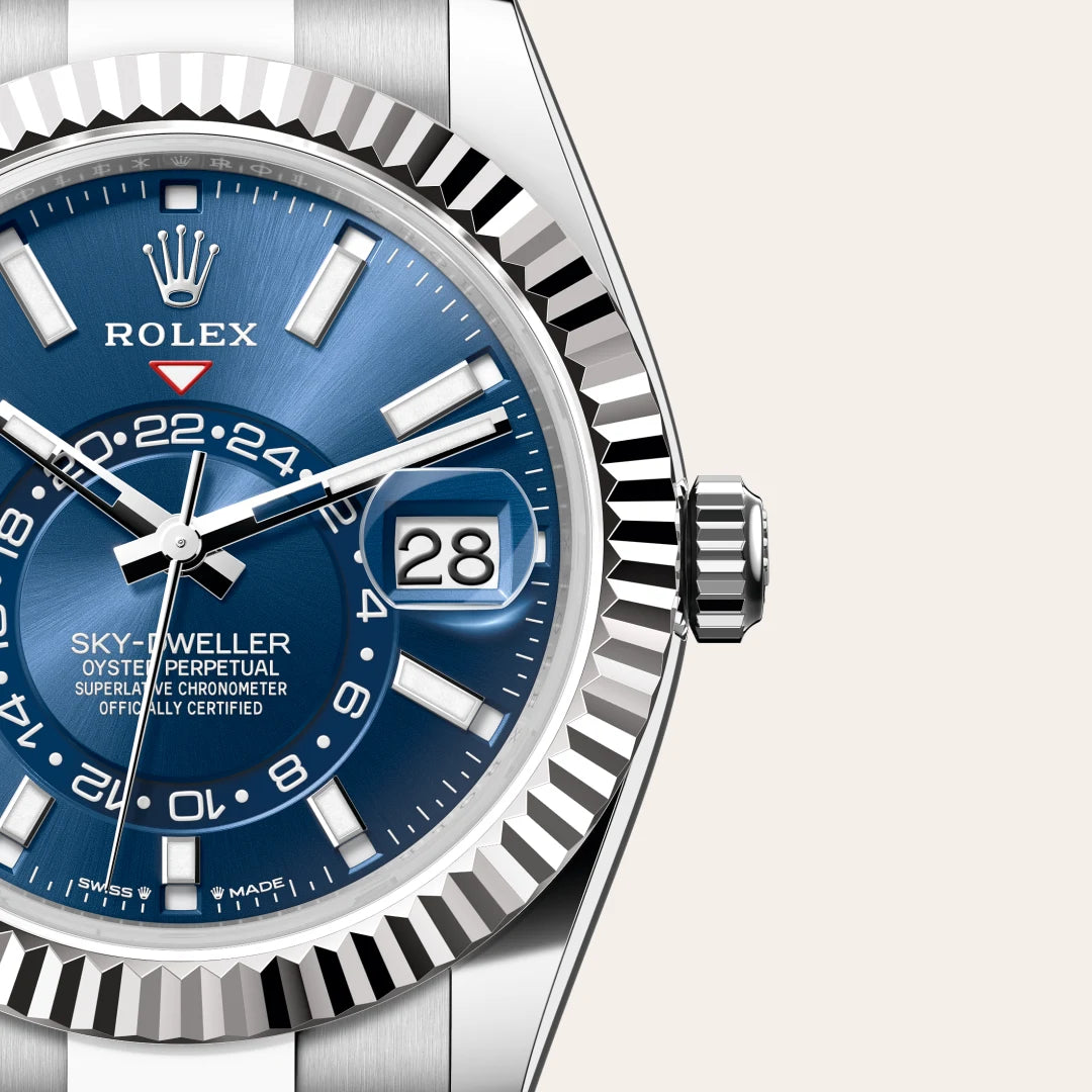 Rolex Sky-Dweller in White Rolesor - combination of Oystersteel and white gold with a Bright blue dial, Fluted, bidirectional rotatable Rolex Ring Command bezel, Oyster, three-piece solid links bracelet