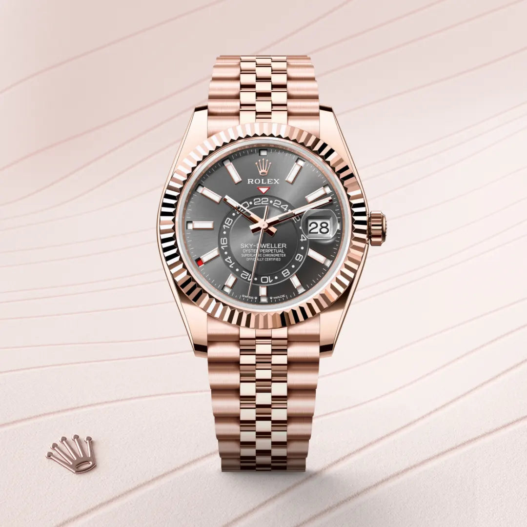Rolex Sky-Dweller in 18 ct Everose gold with a Slate dial, Fluted, bidirectional rotatable Rolex Ring Command bezel, Jubilee, five-piece links bracelet