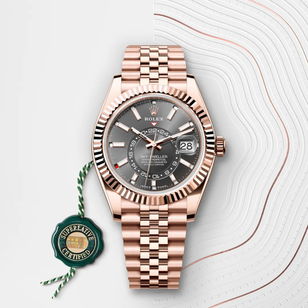Rolex Sky-Dweller in 18 ct Everose gold with a Slate dial, Fluted, bidirectional rotatable Rolex Ring Command bezel, Jubilee, five-piece links bracelet