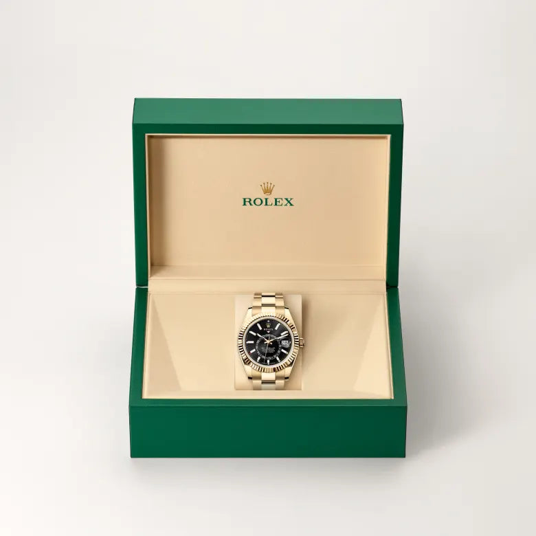 Rolex Sky-Dweller in 18 ct yellow gold with a Bright black dial, Fluted, bidirectional rotatable Rolex Ring Command bezel, Oyster, three-piece solid links bracelet