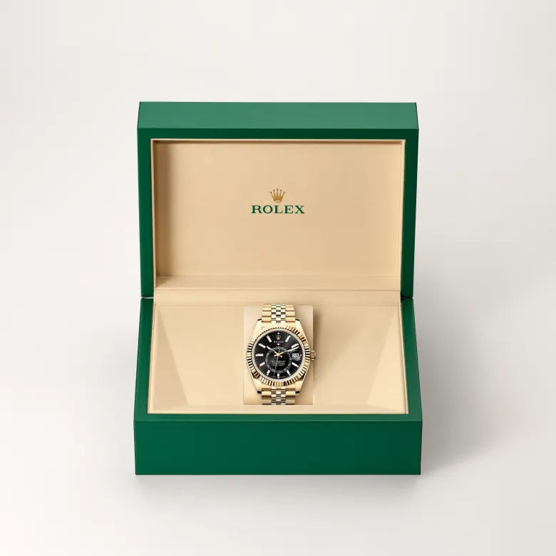 Rolex Sky-Dweller in 18 ct yellow gold with a Bright black dial, Fluted, bidirectional rotatable Rolex Ring Command bezel, Jubilee, five-piece links bracelet