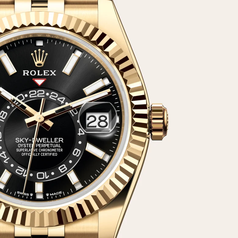 Rolex Sky-Dweller in 18 ct yellow gold with a Bright black dial, Fluted, bidirectional rotatable Rolex Ring Command bezel, Jubilee, five-piece links bracelet