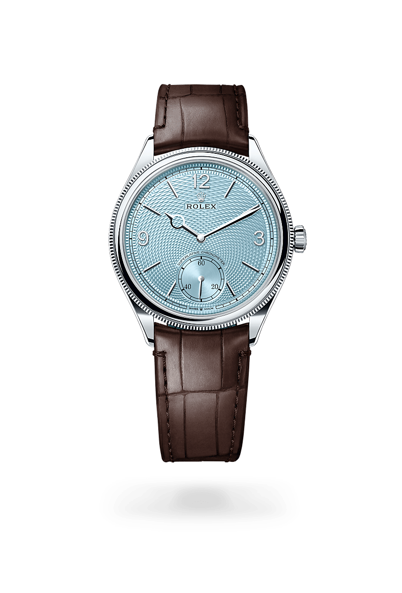 Rolex 1908 in Platinum with a Ice blue, rice-grain motif dial, Domed and fluted bezel, Leather strap bracelet