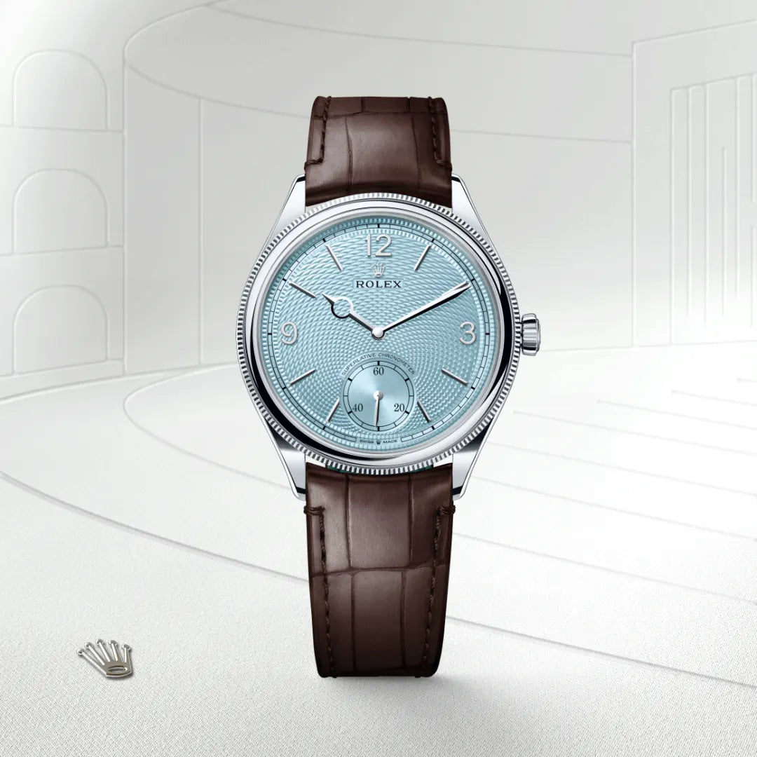 Rolex 1908 in Platinum with a Ice blue, rice-grain motif dial, Domed and fluted bezel, Leather strap bracelet