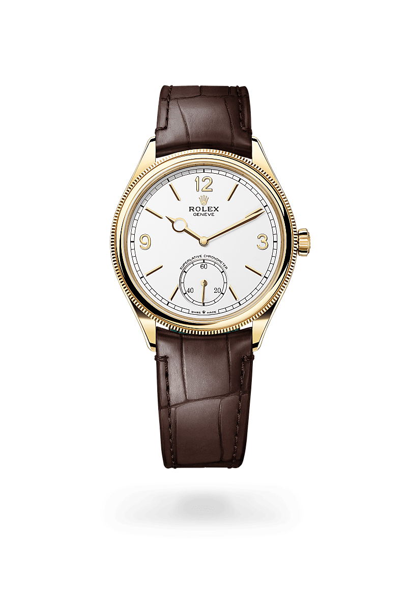 Rolex 1908 in 18 ct yellow gold with a Intense white dial, Domed and fluted bezel, Leather strap bracelet