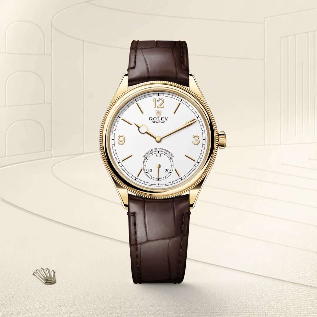 Rolex 1908 in 18 ct yellow gold with a Intense white dial, Domed and fluted bezel, Leather strap bracelet