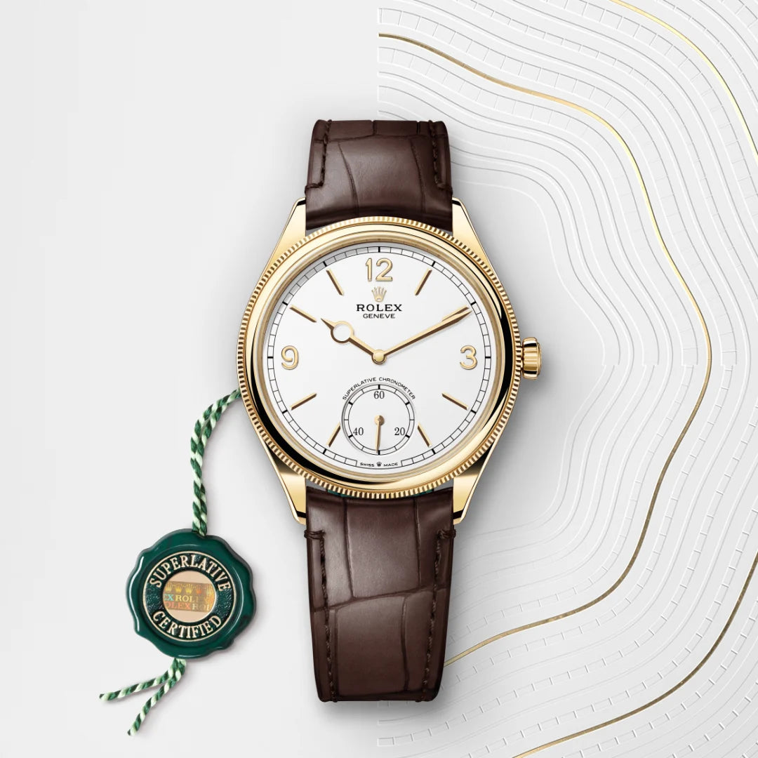 Rolex 1908 in 18 ct yellow gold with a Intense white dial, Domed and fluted bezel, Leather strap bracelet